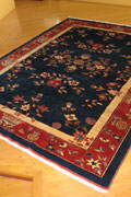Tolidi Floral Hand Knotted Wool Rug