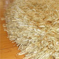 Oval Plain Shaggy Rug Yellow Size 275 x 185cm